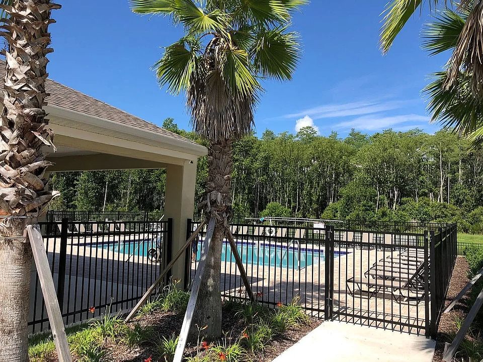 Enjoy the community's resort-style swimming pool and outdoor recreation area.