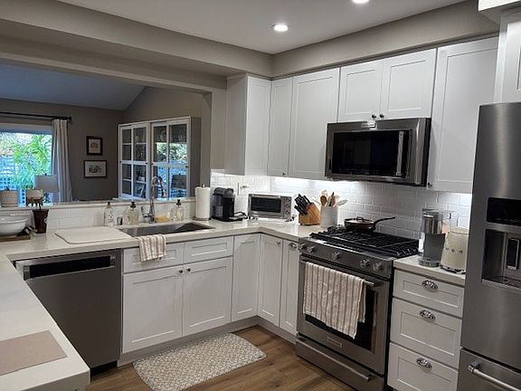 Kitchen with all Kitchen Aid stainless steel appliances.