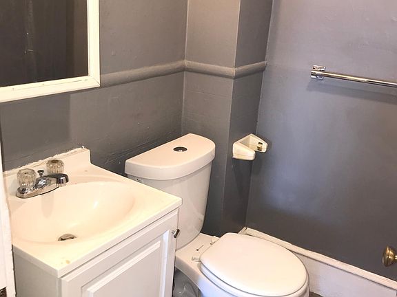 Bathroom with combination tub/shower.
