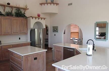 Kitchen Facing Toward Dining Room : Art / Display niches in Kitchen plus large center island with lo