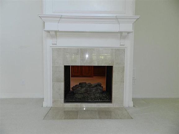 Living Room with Gaslog Fireplace