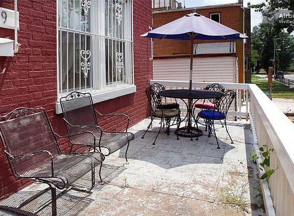 We love to hang out on the front porch and say hello to our neighbors as they walk their dogs past the house.