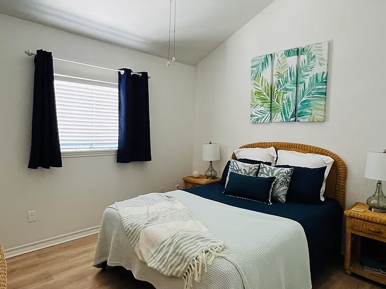 Bedroom #2 with queen size bed. Large walk-in closet.