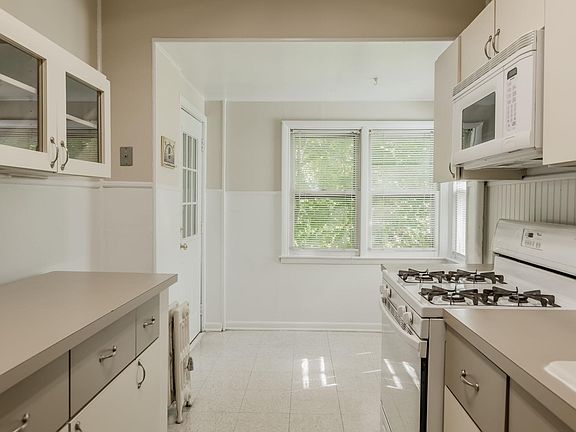 View of kitchen and dining area from hallway