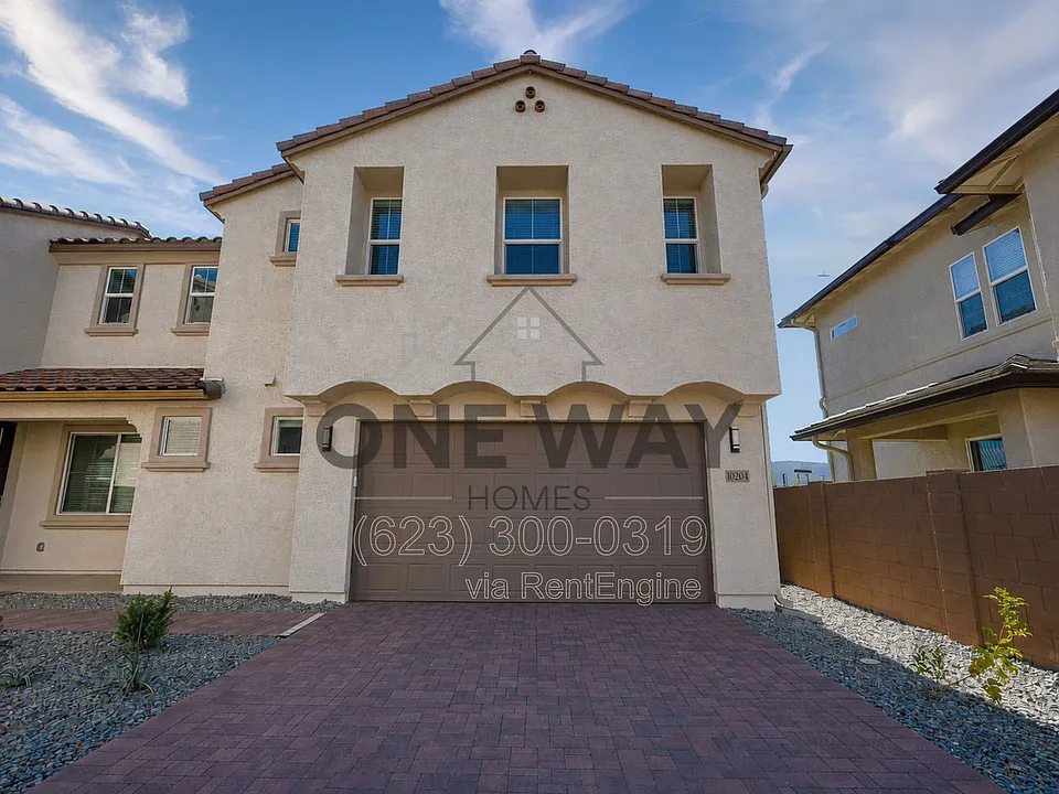 10204 E Ulysses Ave