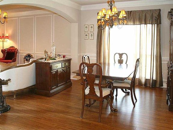 Holiday cheers can be made in the Formal Dining area. Plenty of room for a large table.