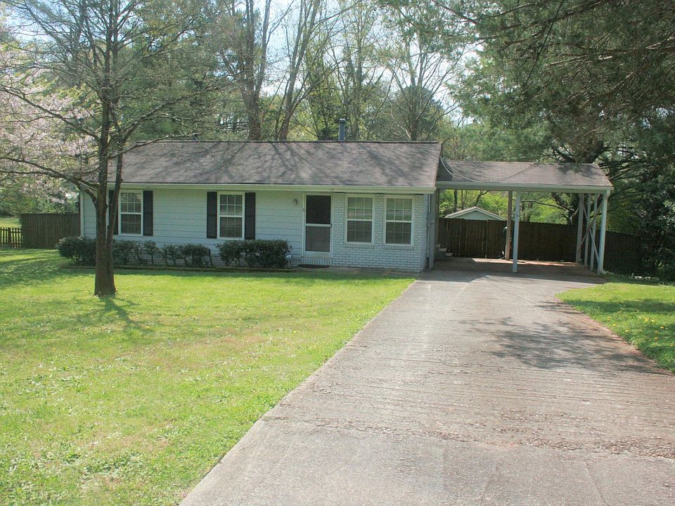 Exterior - 2 car covered parking, complely fenced in yard, large lot