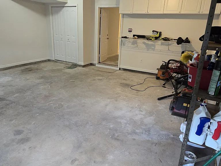 Garage looking back to home entry way to den