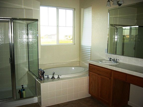                                             Master bath with 2-walkin closets