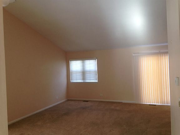 Living Room: Very spacious with high ceilings