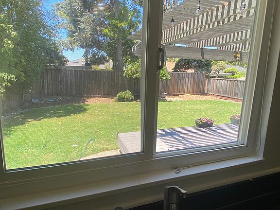 Not a bad view as you wash up. Just wait until the heritage orange tree in the yard is covered in juicy sweet saffron orbs in a few months!