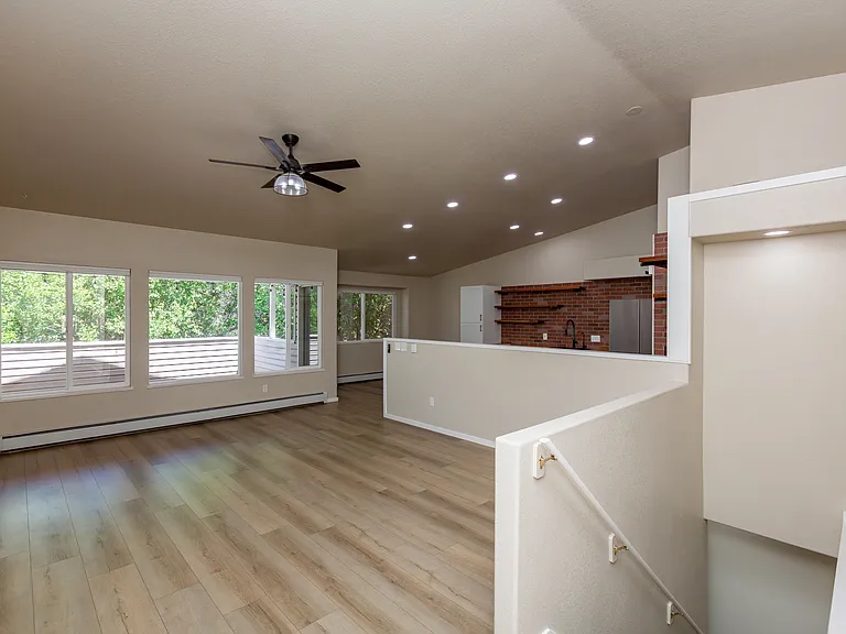 Living room with stairs to the finished basement