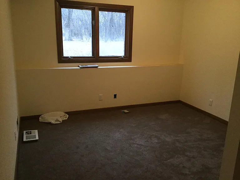 Bedroom with new carpet