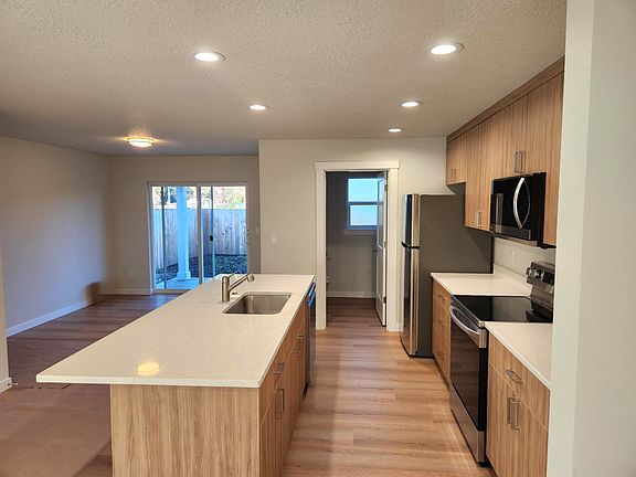 Storage to the left under the stairs