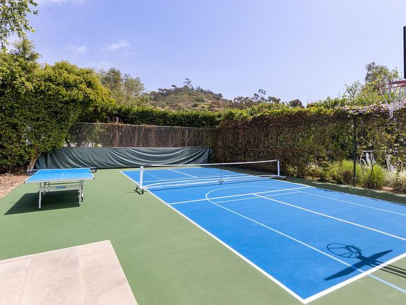 Pickbleball court with basketball court conversion