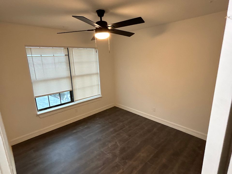 This is the master bedroom upstairs with new laminate flooring installed.