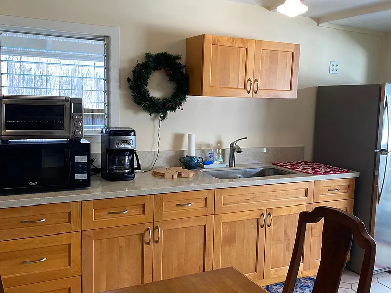 Kitchenette area and dining table.