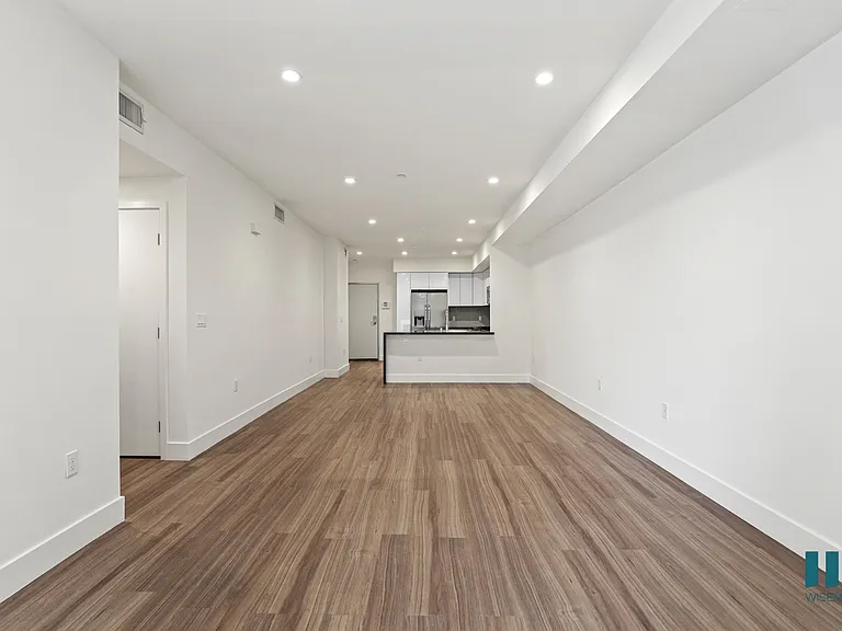 Open-Concept Kitchen, Dining, and Living Room Space