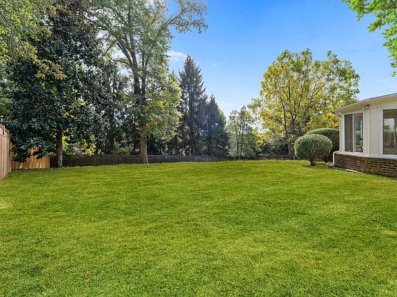 Gorgeous rear fully fenced yard with lots of room for playing ball or entertaining!