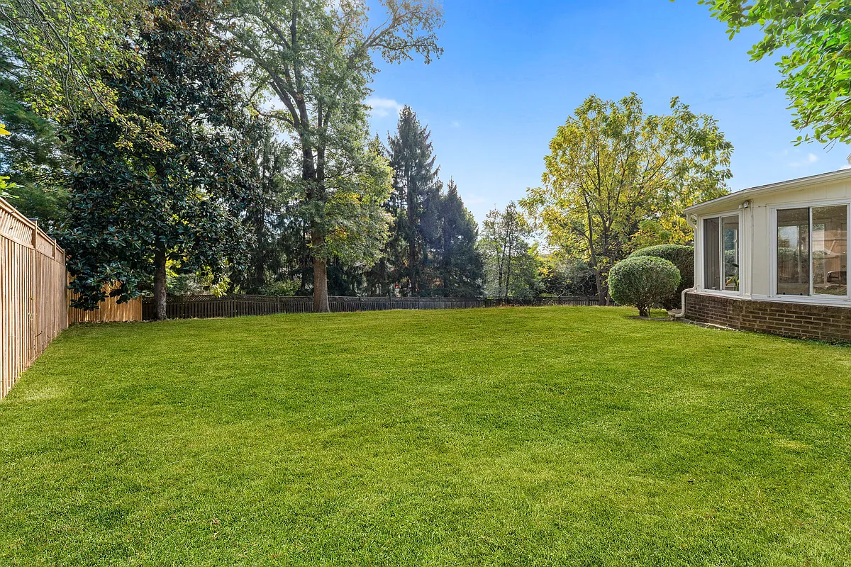 Gorgeous rear fully fenced yard with lots of room for playing ball or entertaining! - 9 Snug Hill Ct