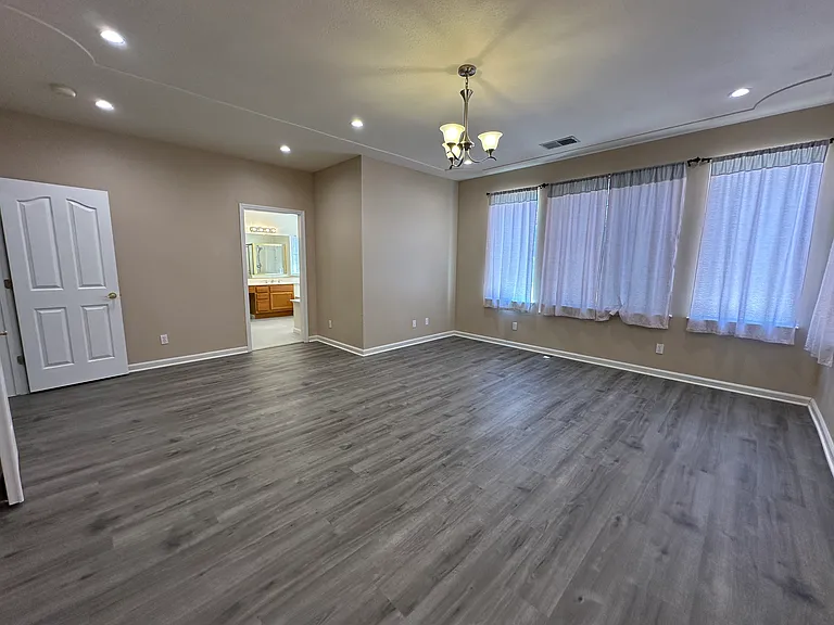another view of the primary bedroom