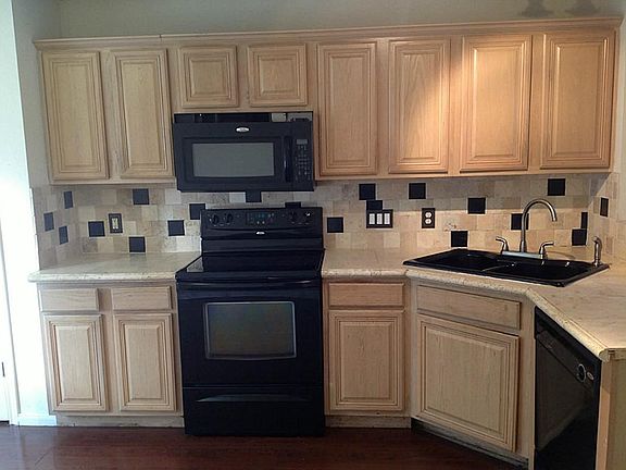 Updated kitchen with nice flooring.