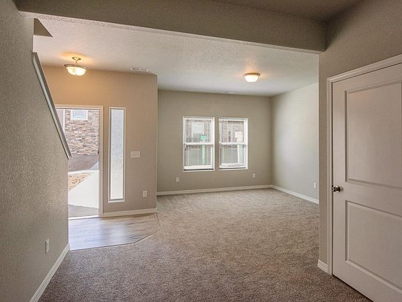 Flex room (1st floor entrance), with has a half bath and access to garage.