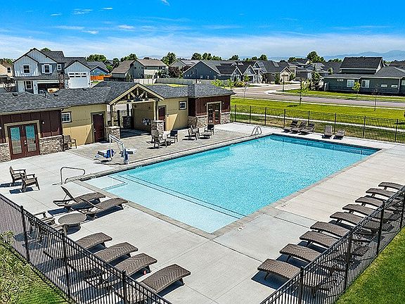 Private community pool with lounge chairs
