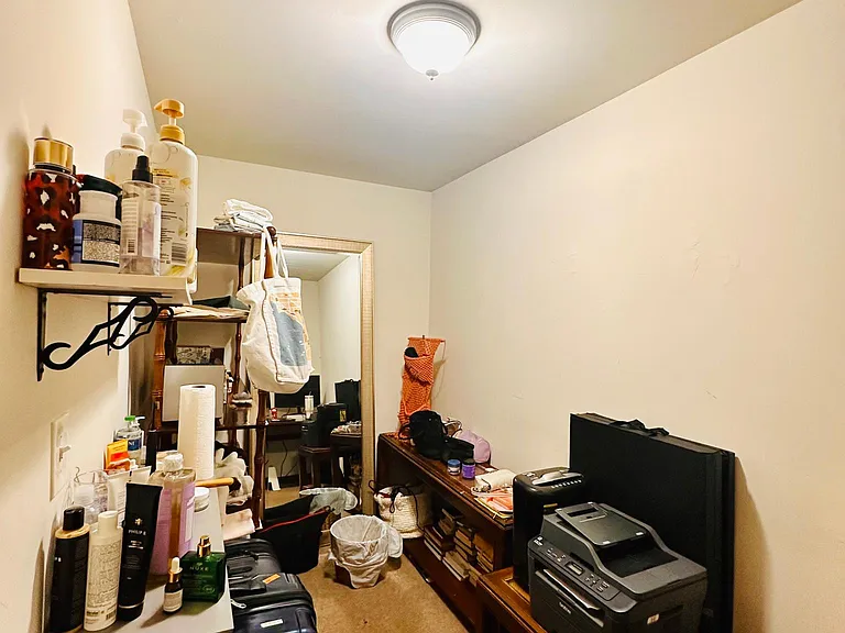 Bedroom #2's walk in closet used as office