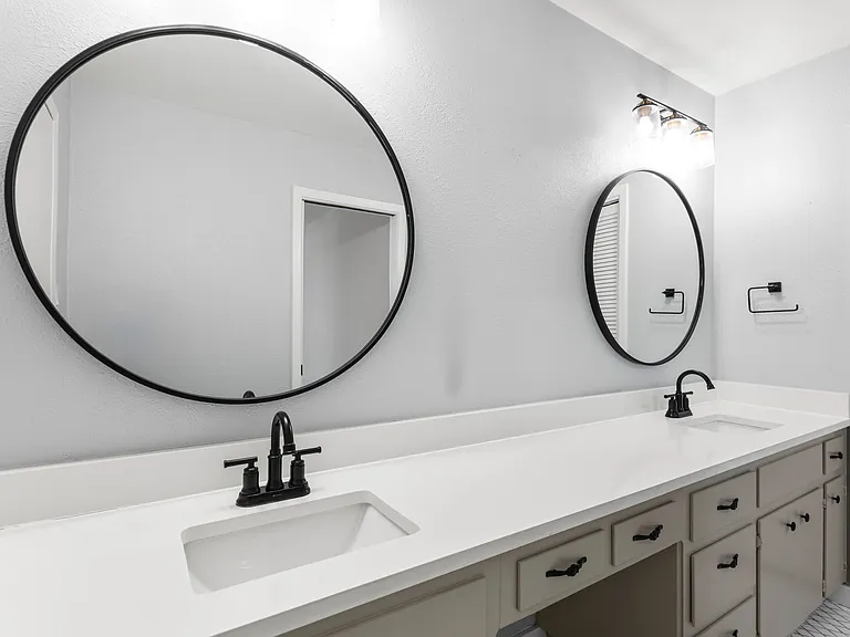 En suite master bathroom/smaller closet door on right side of picture