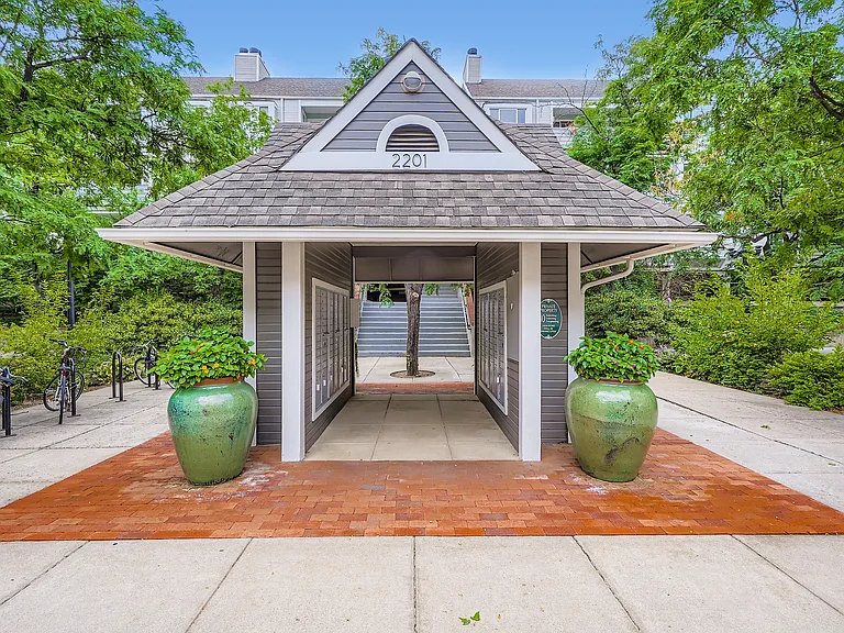 One of the entries to the building (from the north, where the courtyards are). Bike parking and mailboxes are here. Unit is visible in upper-right part of photo