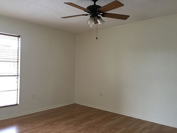 Open Bedroom with Laminate floors