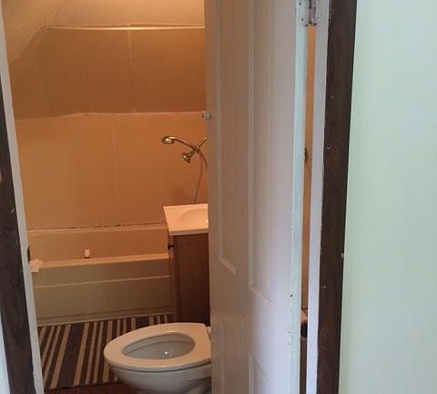 Bathroom with new toilet.