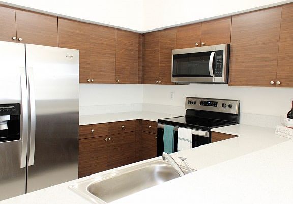 Kitchen Complete With Granite Countertops & Stainless Steel Appliances