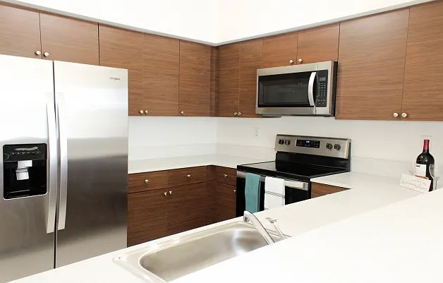 Kitchen Complete With Granite Countertops & Stainless Steel Appliances