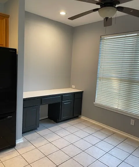 Workspace area, off of kitchen, Ample cabinet space.
