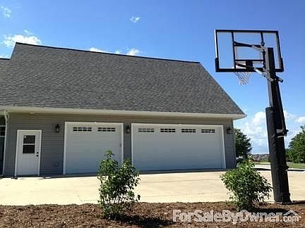 Garage
						:
						Oversized 3 car garage with plenty of room for toys. Over 25' deep!