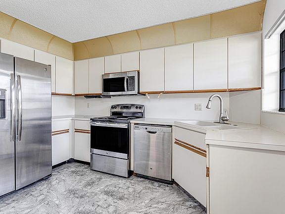 2nd image of 5835 Parkwalk Dr #313