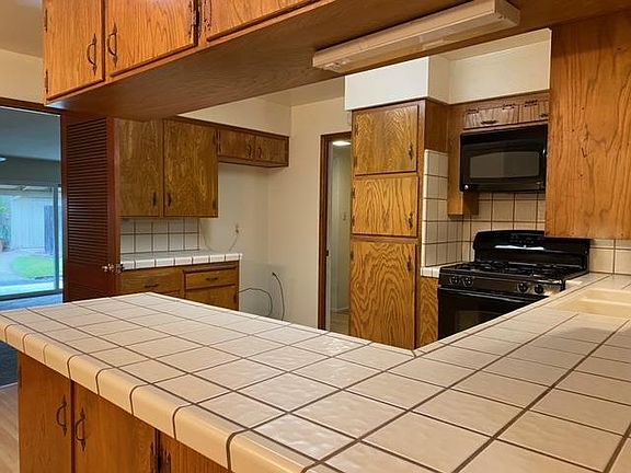 5th image of 7025 Woodknoll Way