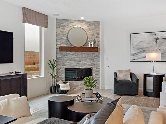 Interior fireplace in the gathering room adds warmth and ambiance for relaxing on cool New Mexican e