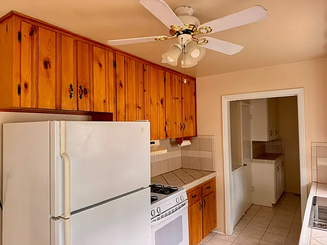 Kitchen. Fresh paint and cleaned and lined cabinets