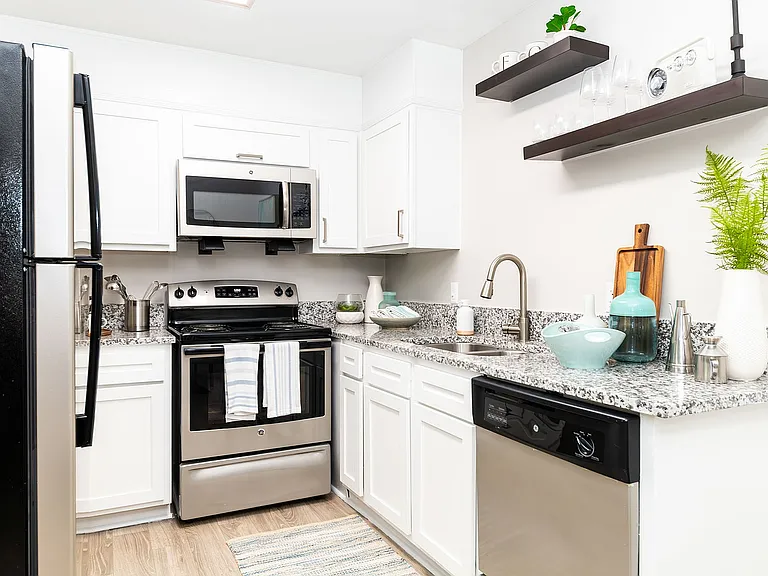 Kitchen with granite counters and stainless appliances
