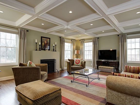 Beautiful millwork and wide plank hardwood floor carry throughout the hosue