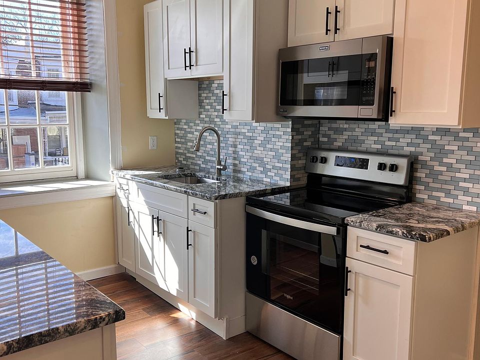 Spacious Kitchen with new Appliances, plenty of Shelves and Storage