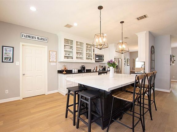 The utility room and pantry are through the door on the right