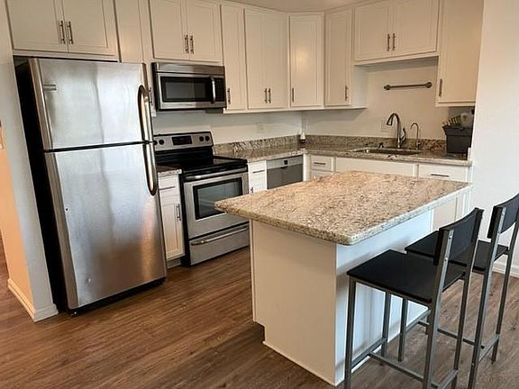 NEW KITCHEN WITH ISLAND AND SEATING