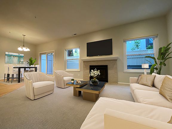 Open and airy floor plan - dining room flows into the living room.