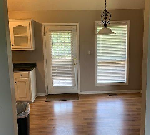 Dining/kitchen off the living room.