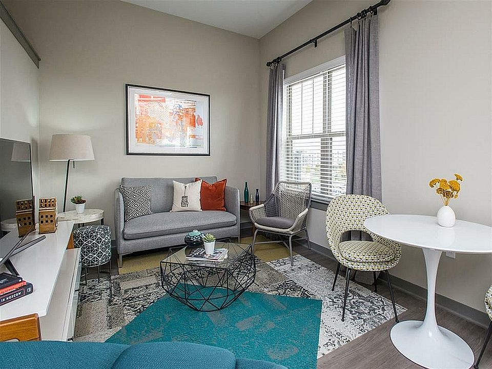 Experience comfort and style in this beautifully decorated urban living room.