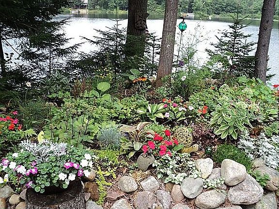 Garden next to patio lakeside